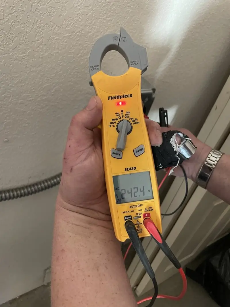 Voltage testing with clamp meter during Generator Installation in Orchard Park